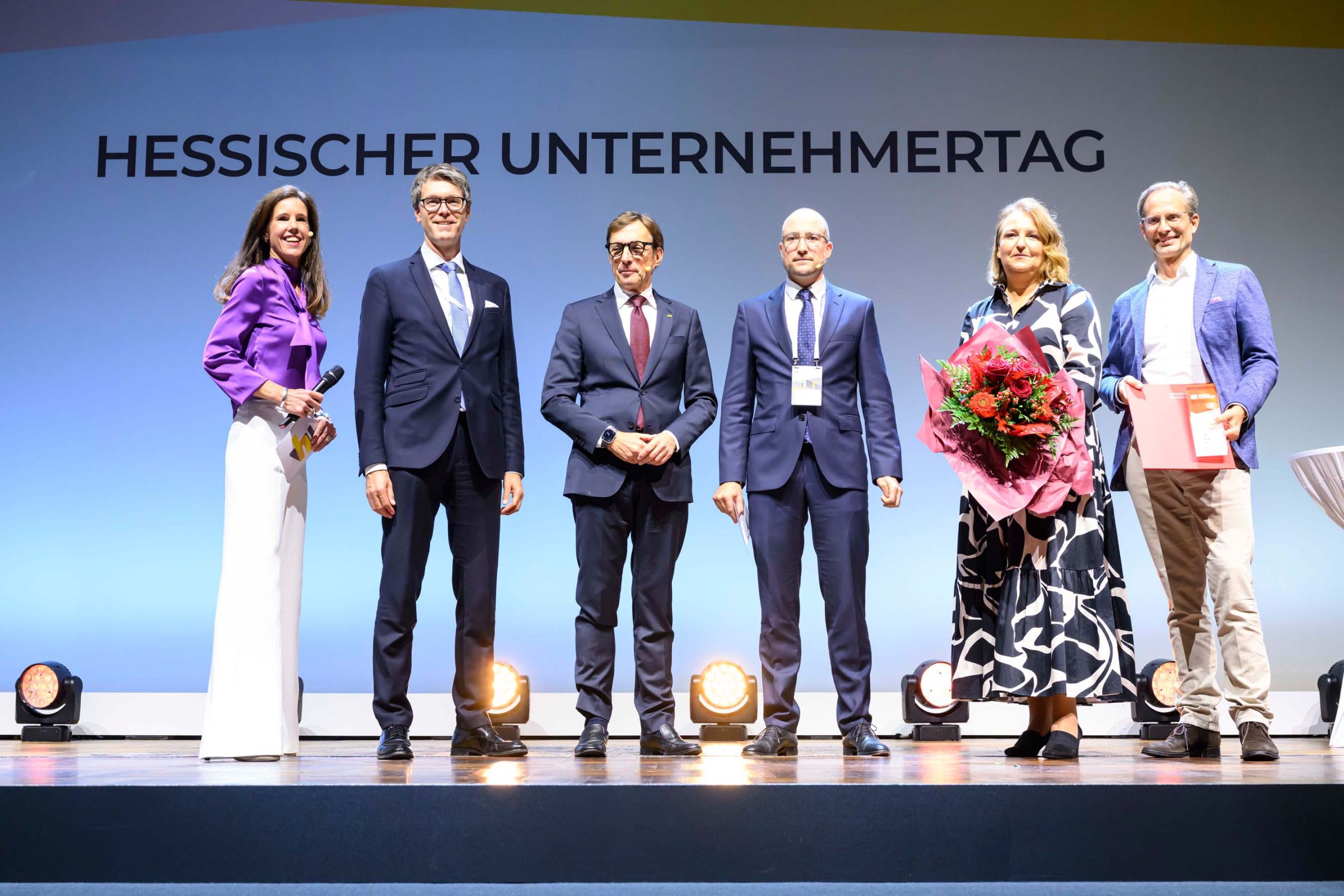 Glinicke Automobil Holding GmbH & Co. KG | Anika Kretschmar, Florian Glinicke auf der B&uuml;hne